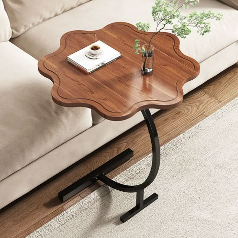 This modern and luxurious coffee table is the perfect addition to the living room, a combination of both looks and functionality. It features fashionable petal-shaped legs, a small, storage-friendly frame, and modern simplicity design, elevating the interior of any home. Enjoy your coffee in style with this elegant piece of furniture. Specifications With Rollers: No Type: Living Room Furniture Specific Use: Coffee Table Shape: Round Is Retracted: No General Use: Home Furniture Folded: No Appeara Small Modern Coffee Table, Living Room With No Coffee Table, Coffee Table Styling Ideas Modern, Small Coffe Table, Storage Ideas For Living Room, Small Coffee Tables, Modern Table Legs, Luxury Home Decor Accessories, Folding Coffee Table