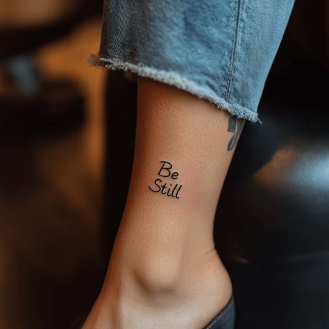 be still faith tattoos Faith Fine Line Tattoo, Tiny Christian Tattoos For Women, Dainty Christian Tattoos, Still Tattoo, Be Still Tattoo, Faith Tattoos, Cross With Wings, Bible Verse Tattoos, Verse Tattoos