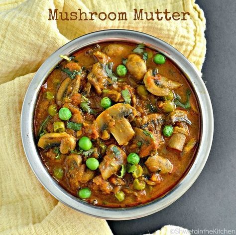 Mushroom Mutter Masala Or Mushroom and Green Peas Curry is mouthwatering North Indian dish served Mushroom Recipes Indian, Food Biryani, Mushroom Masala, Mushroom Curry, Delivery Food, Tomato Gravy, Veg Food, Indian Bread, Dried Mangoes