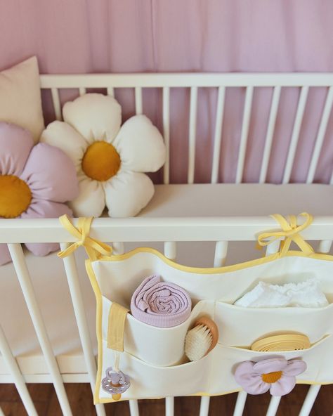 💛 Complete your floral-themed girl’s nursery with our beautiful #handmade DAISY DECOR PILLOW in calming lilac and white. This gentle hue is soothing to the eyes and is often used in spaces designed for tranquility. White daisies, with their whimsical charm and timeless appeal, symbolize innocence, purity and simplicity. Incorporating daisies into your decor brings a touch of sweetness and nostalgia, infusing any space with a sense of playfulness and light-heartedness. Add magic to any playroo... Purple And Yellow Nursery Girl, Purple And Yellow Nursery, Sunny Nursery, Yellow Nursery Girl, Yellow Kids Rooms, Daisy Decor, Nursery Baby Girl, Purple Room, Nursery Girl