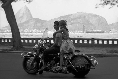 Couple riding a motorcycle in Rio de Janeiro, Brazil 1963. . . . . . #vintage #vintagestyle #vintagefashion #brazil #riodejaneiro… Frank Horvat, Riding Motorcycle, Vintage Motorcycle, Wild Child, Harper's Bazaar, Ride On, Two People, White Photography, Rio De Janeiro