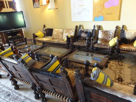 A view of the lobby at the Goha Hotel in Gondar, Ethiopia, decorated with traditional Ethiopian furniture. Located at the top of a hill, the hotel has a nice terrace overlooking the city. Ethiopian Furniture, Ethiopian Fabric, Gondar Ethiopia, Rapunzel's Tower, Ideas Casa, The Lobby, Traditional Living, Traditional Living Room, A Hill