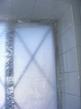 Bubble Wrap Storm Window (Insert) : 5 Steps (with Pictures) - Instructables Storm Windows Diy, Bubble Wrap Windows, Clear Shower Curtain, Sliding Glass Windows, Window Inserts, Window Shelves, Storm Windows, Dollar Tree Store, Wire Hangers