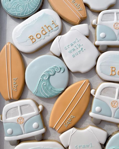 That onesie tho 💙 #babyshower #babyshowercookies #busybeesweet #longbeach #sugarcookies #decoratedcookies Surfer Gender Reveal Ideas, Baby On Board Cookies, The Big One Cookies, Surf Cookies, Surfboard Cookies, Surfer Baby Shower, Royal Cookies, Surfer Baby, Turtle Baby Shower