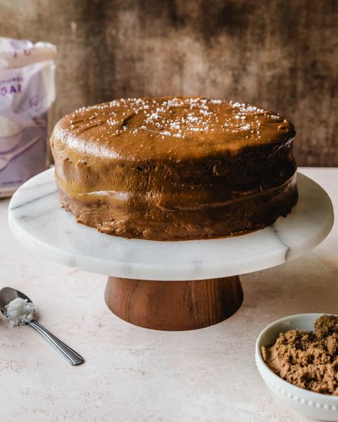 "With its cloud-soft yellow cake and rich golden frosting that melts in your mouth like fudge, this Salted Caramel Cake is truly the layer cake of your dreams. Each bite offers a perfect balance of flavors and textures that will have you coming back for more. While the salted caramel frosting might take center stage with its sweet, buttery flavor and just the right hint of salt, the soft, tender yellow cake beneath it is equally important. Made with cake flour, this 2-layer yellow cake has an Copycat Drink Recipes, Ritz Cracker Recipes, Cool Whip Desserts, Salted Caramel Cake, Crumb Cake Recipe, Homemade Doughnuts, Pumpkin Bundt Cake, Dairy Desserts, Frozen Dessert Recipe