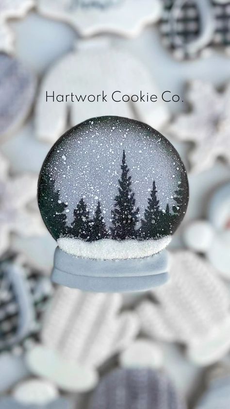 24K views · 182 reactions | ❄️Welcome to the holiday season! Just like that, we’re wishing for snow (well, some of us are🙋🏻‍♀️)! It seems overnight all the leaves fell off the trees, ready for their branches to be coated in snow! This cookie really dates me! This was one of the very first cookie videos I ever put out on social media - way before reels were a thing. Still to this day, I get messages from people wondering where the video went. I figured it was time to turn the this snow globe tutorial into a reel! If you remember this cookie, we go way back (5 years to be exact!), and if that’s the case, thank you so much for stinking around🫶🏻 -Tree line stencil by @killerzebras -Edible glitter by @sweetsugarbelle -Flecks of snow made using white @americolor food gel . . . . . . . #royal Snowglobe Cookies, Christmas Sugar Cookies Decorated, Christmas Cookie Party, Cookie Decorating Supplies, New Years Cookies, First Day Of Winter, Making Cookies, Winter Cookie, Cookie Videos