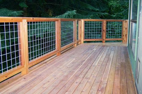 Cedar deck and hogwire rail Reling Design, Deck Railing Diy, Wire Deck Railing, Hog Wire Fence, Patio Railing, Deck Railing Design, Cattle Panels, Cedar Deck, Deck Designs Backyard