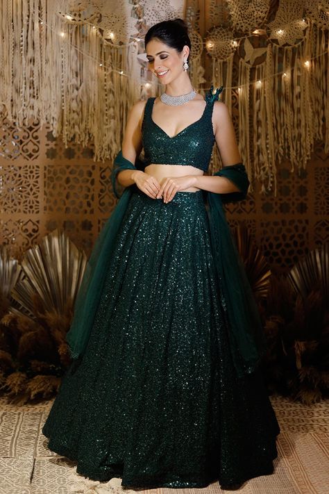 Gowns Dresses For Reception, Dark Green Lehenga Designs, Lehenga Designs Sleeveless, Sequin Lehenga Indian Weddings, Dark Colour Lehenga, Dark Green Lehenga Combination, Dark Green Lengha, Shimmer Lehenga Sequins, Green Lehenga Designs