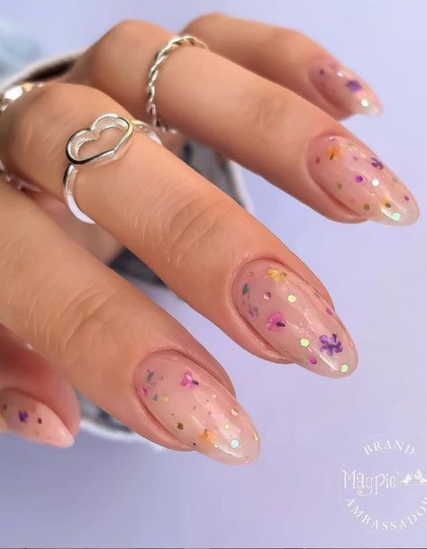 The Season's Brightest Spring Festival Almond Nail Design Almond Manicure, Floral Confetti, Violet Nails, Nail Color Trends, Spring Acrylic Nails, Almond Nails Designs, Almond Nail, Easter Nails, Violet Flower