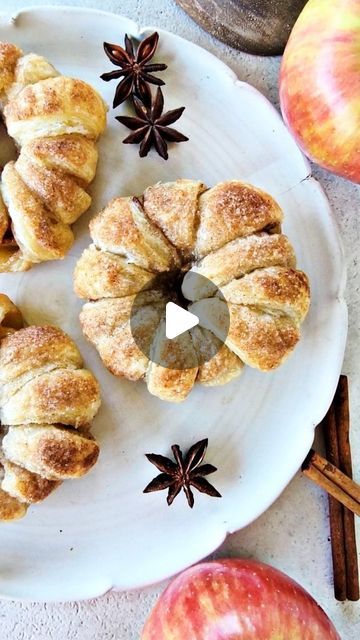 Jolene Kesler on Instagram: "Apple Puff Pastry Buns - Flaky, buttery puff pastry dough is wrapped around an apple that is sprinkled in cinnamon sugar. The buns are baked until golden and crisp and the apple is tender on the inside. Dessert doesn’t get much easier than this. Recipe below. You can also find the recipe on my blog simplebakingwithpep.com. 
https://simplebakingwithpep.com/apple-puff-pastry-buns/

Apple Puff Pastry Buns
2 large apples, peeled and cored
1 box frozen puff pastry
2-3 tablespoons unsalted butter, melted
¼ cup granulated sugar
½ teaspoon ground cinnamon

1. Preheat oven to 350F. Line a baking sheet with parchment paper. Set aside. In a small bowl, whisk together sugar and cinnamon.
2. Peel and core the apples. Cut apple into slices, crosswise (lay apple on side and c Bramley Apple, Apple Puff Pastry, Puff Pastry Dough, Frozen Puff Pastry, Pastry Dough, Small Bowl, Cinnamon Sugar, Ground Cinnamon, Parchment Paper