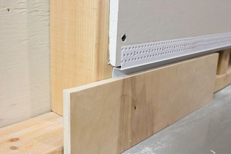 Drywall Reveal Baseboard with Z Shadow Bead | Trim-Tex Baseboard Alternative, Reveal Baseboard, Drywall Reveal, Shadow Gap Skirting, Modern Baseboards And Trim, Baseboard Design, Drywall Ideas, Trim Tex, How To Install Baseboards