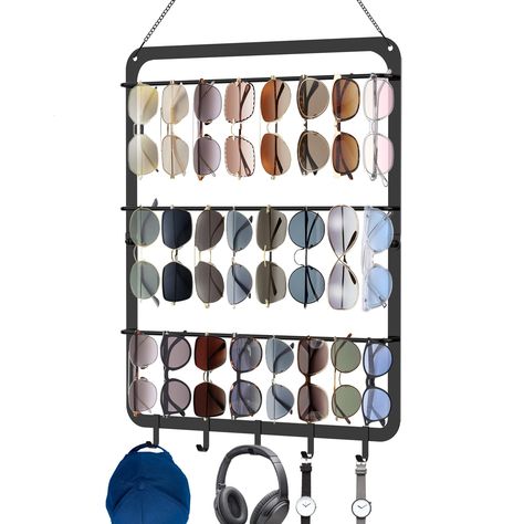 PRICES MAY VARY. 🕶【Upgraded 3 Tier Sunglasses Organizer with 5 Hooks】By upgrading to a 3-layer design plus 5 removable hooks, each tier can hold 8 pairs of sunglasses , our sunglass rack can hold a total of 29 pairs of glasses. The compact designed eyeglass rack has big storage capacity, you can easily organized all your sunglasses with it. 🕶【Sturdy and Reliable】Compared with other acrylic materials on the market, our sunglasses holder rack is made of high quality solid iron, using advanced po Sunglass Rack, Simple Sunglasses, Closet Storage Accessories, Eyewear Display, Sunglasses Organizer, Sunglasses Storage, Metal Eyeglasses, Sunglasses Holder, Storage Wall