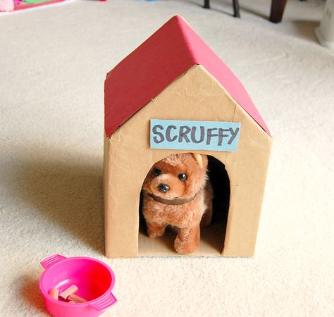 Little homemade toy doghouse with stuffed toy dog Cardboard Dog, Diy Cardboard Toys, Cardboard Diy, Ikat Bag, Valentine Diy, Cardboard Box Crafts, Cardboard Toys, Dog House Diy, Art Camp