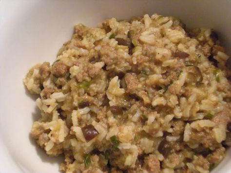 Eggplant Rice Dressing- Cajun from Food.com: This is a healthy and tasty alternative to dirty rice. Also a great way to get the kids to try and love eggplant! I usually make this with one pound of ground turkey to reduce the fat and calories. To add even more flavor you can increase the onion and garlic if you like but we find it well seasoned as is. Sometimes we will even add some celery in with the onion mixture. Cajun Eggplant Recipes, Eggplant Rice Dressing Recipe, Eggplant Dressing Recipe, Eggplant Dressing, Cajun Rice Dressing, Recipe With Eggplant, Eggplant Rice, Rice Casseroles, Vegetable Casseroles