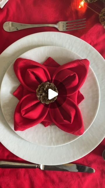 Manuela Mazzocco on Instagram: "✨Poinsettia Napkin Fold✨
Elevate your holiday gatherings with a touch of seasonal charm by incorporating the enchanting Poinsettia Napkin Fold into your Christmas dinner table decor
Find this and several more napkin folds in my website. Link in profile. DM/comment for more 
#napkinfold #tutorial #howto #napkin #tabledecor #holidaytable" Diamond Pocket Napkin Fold, Napkin Folding Ideas In Bowl, Napkins Christmas Ideas, Snowflake Napkin Fold, Poinsettia Napkin Fold, How To Fold Napkins For Christmas, Napkin Folding Ideas For Christmas, Napkin Folding For Thanksgiving, Cloth Napkins Folding Ideas