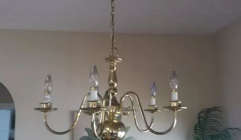 Do you have an old dining room light fixture in need of an update? Why not check out my elegant and sparkly before and after DIY? New crystal chandeliers can be hundreds, if not thousands, of dollars and that was definitely not in the budget. However, with a little bit of creativity, my old, boring brass chandelier got a dramatic and glamorous makeover for a fraction of the cost. It’s hard to believe it’s the same light fixture.  Supplies: Two Large Embroidery Hoops Fabric… Tin Wainscoting, Old Dining Room, Chandelier Makeover, Drum Shade Chandelier, Diy Stained Glass Window, Antique Brass Chandelier, Dining Room Light Fixture, Large Embroidery, Diy Staining