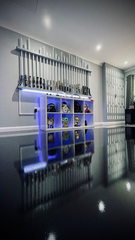 Over 100 lightsabers. Some wall mounted, some displayed in horizontal Kallax. #lightsaber #mancave #saberlife Lightsaber Collection Display, Lightsaber Wall Mount, Lightsaber Display, Custom Lightsaber, Star Wars Lightsaber, Star Wars Room, Collection Ideas, Star Wars Light Saber, Star Wars Costumes