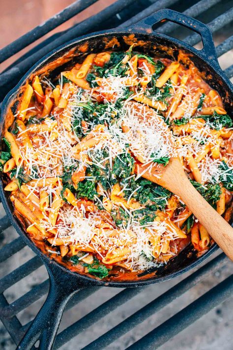 Combining red lentil pasta with garlicky sauteed kale, this super easy one pot camping meal delivers a ton of protein while still being completely vegetarian.   After thoroughly exploring St. George and Zion National Park, we drove east to the red rock arches of Moab, UT. Southern Utah is filled with some of the most spectacular rock formations in the world, and we were once again floored by how awesome the landscape was when we got there. As fate would have it, our paths once again crossed ... One Pot Vegetarian, Best Camping Meals, Lentil Pasta, Protein Pasta, Sauteed Kale, One Pot Pasta Recipes, Vegetarian Protein, Easy Camping Meals, Gourmet Cooking