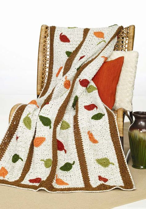 Crochet a beautiful afghan for autumn with colorful falling leaves. This intermediate afghan crochet pattern is worked from side to side beginning at right hand edge. Thanksgiving Crochet, Falling Leaf, Autumn Crochet, Crocheted Afghans, Crochet Leaf Patterns, Fall Crochet Patterns, Crochet Afghan Patterns Free, Crocheted Blanket, Crochet Afgans