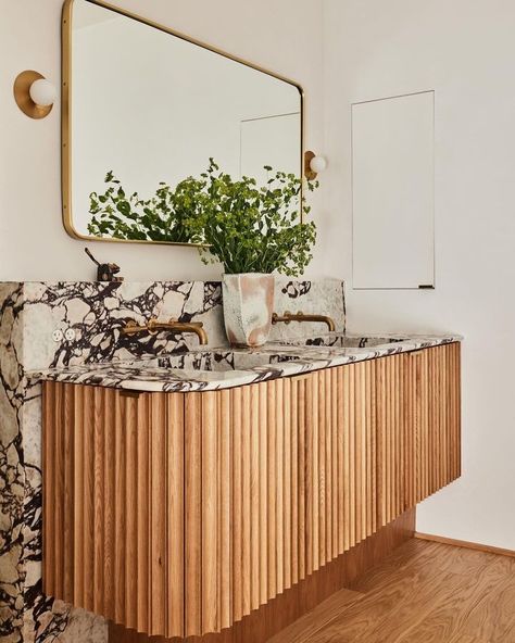 fluted vanity • Instagram 265 Wall Lamp, Malibu Beach House, Travertine Coffee Table, Latest Design Trends, Wood Vanity, Bathroom Collections, Plaster Walls, Lavatory Faucet, Pierre Frey