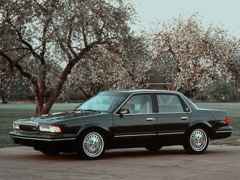 a box car reminiscent of the 90s. it's a 1996 buick century, black, stanced in front of cherry blossom trees Trucks Lifted Diesel, Cool Buildings, Buick Cars, Trucks Lifted, Automotive Locksmith, Tata Motors, Old School Cars, Buick Century, Car Advertising