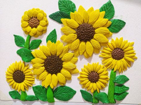 Sunflower clay art. Made of kid's modelling clay. 6 sunflowers. 3d Sunflower, Clay Wall Hanging, Clay Arts, Clay Designs, Clay Wall, Modeling Clay, Clay Design, Clay Art, Sunflower