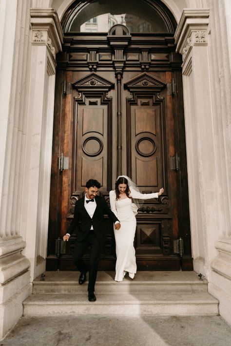 couple running out of City Hall in New York city after their elopement ceremony. City Hall Wedding Photos Nyc, Eloping In New York City, New York City Courthouse Wedding, Wedding Photos City Hall, City Hall Wedding New York, Elope New York, New York Elopement Photography, Nyc Wedding Dress, Courtroom Wedding Photography