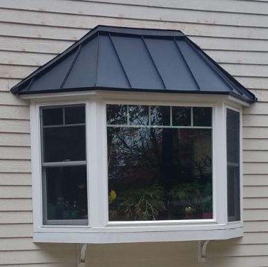 Bay Window Exterior Ideas Curb Appeal, Bay Window Awnings Exterior, Modern Bay Window Ideas Exterior, Window Roof, Metal Roof Window Awning, Bay Windows Exterior, Bay Window Roofing Ideas, Bay Window Roof, Bay Window Exterior Trim