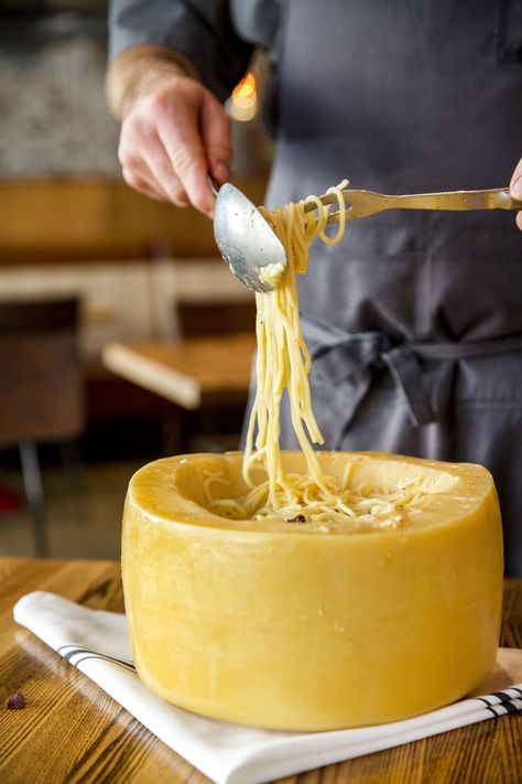 We’ve probably all seen the trend in videos from diners out in NYC, LA, Paris, and Rome. But what if we told you that you can find that viral, trendy, cheese wheel-tossed-pasta right here in Columbus, OH? Pelino’s Pasta uses a 60lb wheel of Pecorino Romana that’s been imported straight from Lazio, Italy to toss... Pasta Cheese Wheel, Pasta In Parmesan Wheel, Roman Noodles, Cheese Wheel Pasta, Italy Pasta, Noodle Restaurant, Cheese Wheel, Lazio Italy, Pecorino Cheese