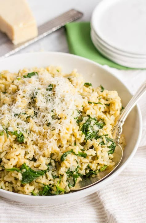 Brown rice with spinach and Parmesan cheese - Family Food on the Table Brown Rice Side Dish, Brown Rice Dishes, Rice With Spinach, Rice And Spinach, Rice Recipes Side, Parmesan Rice, Recipes With Parmesan Cheese, Healthy Rice Recipes, Rice Side Dish Recipes