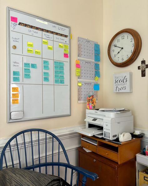 Part of my corner of quasi-sanity. Never you mind that the top of the whiteboard still says “July.” My tasks” notes are logical. Probably. Side note: see my jar on the printer that has my “completed” stickies from the past few weeks? Ok, (1) that was a genius thing I saw Tammi Labrecque (the Newsletter Ninja) do, and it’s super helpful when I feel like I’m getting nowhere, and (2) I dreamt last night that the jar had grown to where it was about to knock the clock off the wall and the notes i... Work Whiteboard Organization, Whiteboard Set Up Home, Office White Board Ideas Fun, Whiteboard Bedroom, Whiteboard Organization Office, Whiteboard In Office, Whiteboard Layout, Graphic Design Desk Setup Home Office, Workplace Etiquette The Office