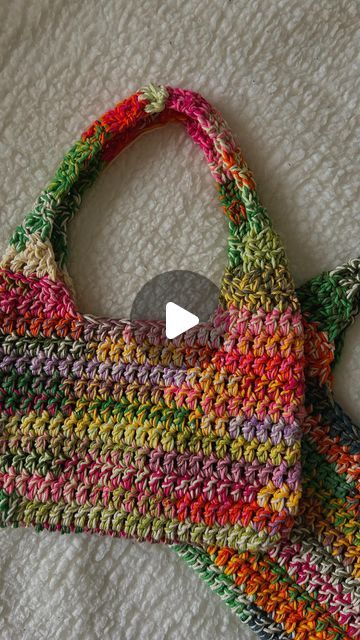 Brenda🌻| crochet artist/designer on Instagram: "Crochet scrap yarn bag✨🌸 ————————— This was so much fun to make. It only took me around 3 1/2 hours to make this🤗 -I had so much scrap cotton yarn laying around. I attached all the scraps together and winded it up into these gorgeous cakes🧁 -I double stranded them to get these crazy color combo’s using a 7.0 mm hook -For the bag I referenced to my kings & queens bag pattern to create this   🌻🌼This bag screams summervibes because of all the colors blended together!!!🌼🌞  🧶all scrap yarn is @dropsdesign Paris ————————— #crochet #crochetbag #crochetscrapyarn #scrapproject #crochetart #crochetartist #crochetdesign #crochetdesigner #crochetpattern #crochetpatterncollective #crochetaddict #crocheter #crochetersofinstagram #crocheted #croche Crochet Scrap Yarn Bag, Yarn Tote Bag, Yarn Tote, Crochet Artist, Crazy Color, Scrap Yarn, Yarn Bag, Variegated Yarn, Gorgeous Cakes