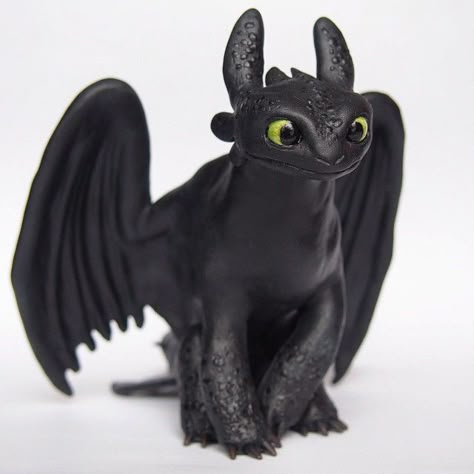 There he is! He was handmade with sculpey polymer clay and meticulously painted with acrylics. He stands 5 1/2 inches tall I'm about to paint Hiccup right now and I'm also making the base. #httyd #howtotrainyourdragon #toothless #dragon #sculpey #polymerclay #sculpture #figurine #ooak #unique #animation #movie #dreamworks #dragonsfanspotlight Toothless The Dragon, Toothless Dragon, Dragon Crafts, Polymer Clay Figures, Clay Dragon, Polymer Clay Animals, Animation Movie, Polymer Clay Miniatures, Hiccup