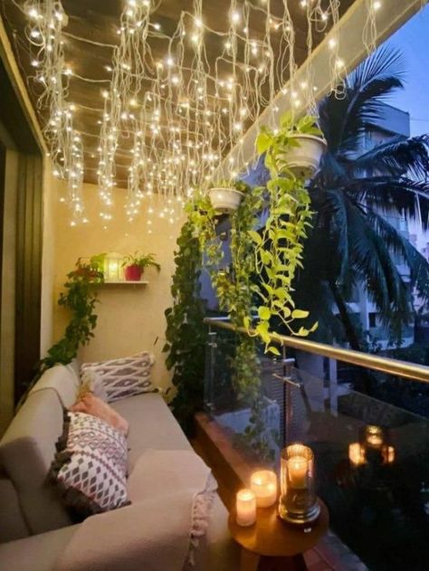 Apartment balconies are a small space with huge potential. Here are a few apartment balcony decor ideas to spruce up your outdoor space. Small Balcony Hanging Lights, Huge Balcony Ideas, Tiny Balcony Design, Unique Apartment Ideas, Private Balcony Ideas, Zen Balcony Ideas, Small Apartment Plants, Balcony Lighting Ideas, Zen Balcony