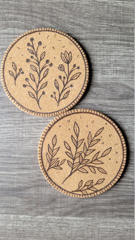 Pyrography Botanical Cork Coaster, Set of 2. Colwood Burner Pen used to Create Botanical Designs on 2 Cork Coasters. Hand Drawn and Hand Burned. Coasters are 4x4 in Circumference. Cork Burning Ideas, Designs For Coasters, Cork Coasters Diy Paint, Wood Burning Coasters Ideas, Cork Coasters Diy, Woodburned Coasters, Wood Burning Coasters, Beginner Wood Burning Projects, Wooden Coasters Diy