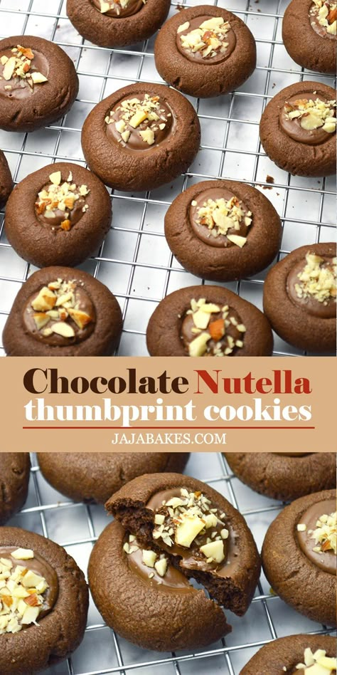 Chocolate Nutella Thumbprint Cookies make a delicious twist on the classic thumbprint cookie! Rich chocolate thumbprint cookies are filled with Nutella spread and topped with chopped almonds are a must-bake for chocolate and Nutella lovers. Nutella Thumb Print Cookies, Chocolate Hazelnut Thumbprint Cookies, Nutella Thumbprint Cookies, Best Thumbprint Cookies, Raya Cookies, Cake Flour Substitute, Paris Bakery, Chocolate Thumbprint Cookies, Thumbprint Cookie