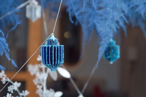 Hanukkah Hanukkah Party Ideas | Photo 1 of 8 Hanukkah Party Ideas, Hanukkah Ornaments, Hannukah Decorations, Blue Table Settings, Hanukkah Party, Chanukah Party, White Tableware, Hanukkah Decorations, Holiday Decorating Ideas