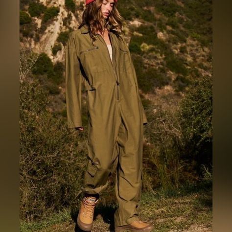 Free People Movement Mesmerize Me Coveralls In The Army Green Color. Brand New With With Tags, Perfect Condition. So Cool And Fun! On Trend One-Piece That Is Easy To Wear, Not The Noisy, Swishy Material But Still Super Soft. Embroidered Logo On Left Pocket, Logo Stamped On All Buttons And Zippers, Functional Utility Pockets In Back And Front, Black Writing With Logo On Sleeves And Pants When Cuffed With Free People Movement Written On A Navy Background In Silicone Gel So It Won't Rub Off, Snap C Jumpsuit Style, Coverall Jumpsuit, Utility Jumpsuit, Stylish Jumpsuit, Green Fits, Green Jumpsuit, Style Cargo, Long Sleeve Jumpsuit, Free People Movement