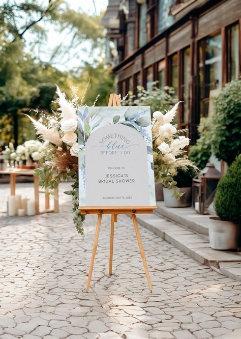 Elevate your bridal shower or Bachelorette party with our enchanting "Something Blue Before I Do" welcome sign, designed in a vintage chic style that adds a touch of elegance to your special day. Crafted in a serene dusty blue hue, this sign not only sets the perfect mood for your celebration but also makes for a cherished keepsake—grab yours today and let your guests feel the love from the very first moment! Blue Bridal Shower Decorations, Blue Bridal Shower Themes, Welcome Sign For Wedding, Party Entrance, Sign For Wedding, Blue Bridal Shower, Event Signage, Shower Themes, Blue Bridal