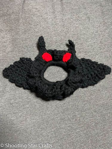 Halloween Crochet Scrunchies, Moth Man Crochet Pattern, Mothman Crafts, Mothman Crochet Pattern Free, Mothman Makeup, Cryptid Crochet, Creepy Crochet Pattern Free, Crochet Mothman, Mothman Crochet