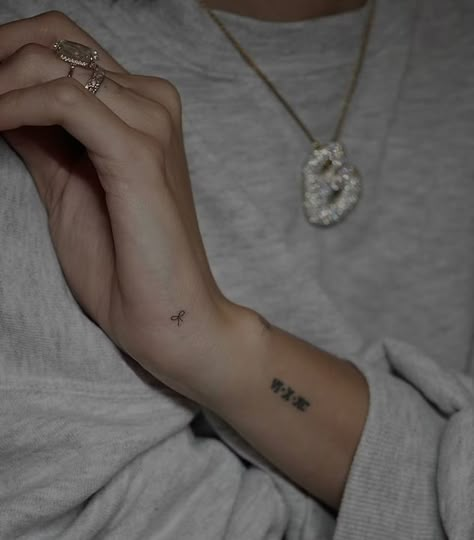 13 Coquette Tattoo Ideas Inspired By Hailey Bieber's Dainty Bow Iv Tattoo, Coquette Tattoo, Tattoo Lace, J Tattoo, Cursive Tattoos, Ribbon Tattoos, Bow Tattoo, Petite Tattoos, Red Ink Tattoos