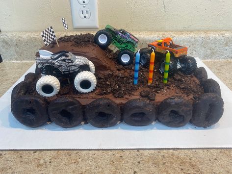 Monster Truck Track Cake, Mini Monster Truck Cake, Monster Truck And Dinosaur Cake, Monster Truck Bday Cake, Blue Monster Truck Cake, Monster Truck Dirt Cake, Young Wild And Three Monster Truck, Monster Jam Bday Party, Dinosaur Monster Truck Cake