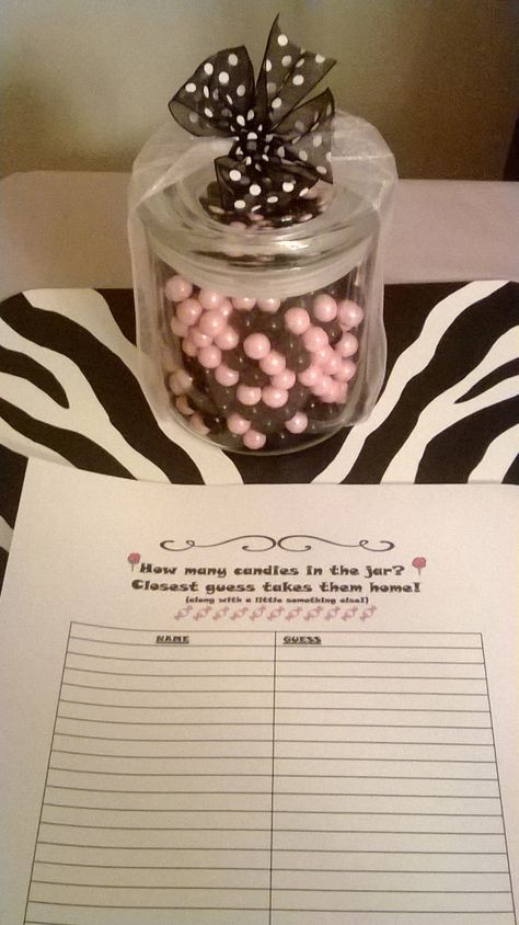 Simple "guess amount of candies in the jar" game. Black and pink sixlets in a bow adorned jar from the craft store.  Created and printed an answer sheet and viola! Guess The Amount Of Candy In The Jar, Guess Candy In Jar Game, Guessing Jar Ideas, Candy Jar Guessing Game, Guessing Jar, Work Appreciation, Intentional Teaching, Golf Fundraiser, Jar Games