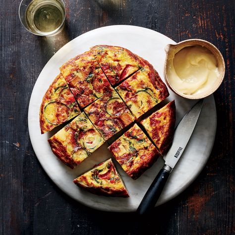 Vegetable Tortilla  | This fantastic Spanish vegetable tortilla includes spinach, zucchini, bell pepper and potato. Get the recipe at Food & Wine. Vegetable Tortilla, Spanish Vegetables, Spanish Tortilla, Tapas Recipes, Spanish Tapas, Spanish Dishes, Tortilla Recipe, Spanish Food, Vegetable Pizza