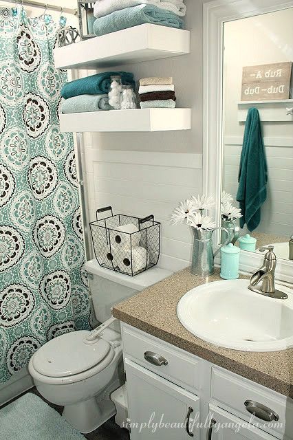 Simply Beautiful by Angela: Bathroom Makeover on a Budget Apartment Planning, Makeover Kamar Mandi, Ny Apartment, Budget Living, Teal Bathroom, Airbnb House, Pretty Storage, First Apartment Decorating, Decor Ikea