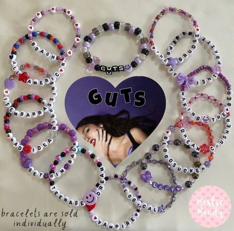 Brainrot Words, Olivia Rodrigo Friendship Bracelet, Olivia Rodrigo Bracelet, Concert Bracelets, Olivia Concert, Clay Bead Ideas, Olivia Rodrigo Concert, Olivia Lyrics, Bracelet Business