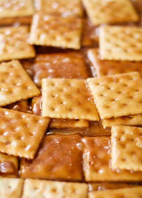 This saltine cracker toffee recipe is made with just 3 simple ingredients in 15 minutes! A seriously addicting treat that's super easy to make. #toffee #toffeecandy #toffeerecipe #saltinecrackers #candy #candyrecipe #easyrecipe #dessert #dessertrecipes #recipes #iheartnaptime Club Crackers With Slivered Almonds, Easy Saltine Cracker Candy, Cracker Desserts Saltiness, Saltine Crackers Toffee, Cracker Cookies Saltine, Saltine Cracker Recipes Sweets, Saltine Cracker Dessert, Toffee Saltines, Saltine Crackers Recipe