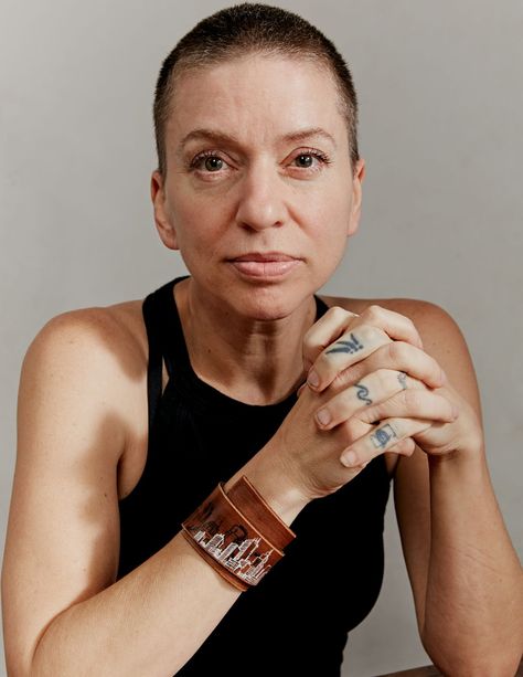 It’s not surprising that Ani DiFranco, who is as much an activist as a folk singer-songwriter, paused as if the breath was taken from her, when asked about Roe v. Wade being overturned. Ms Magazine, Justin Vernon, Ani Difranco, Adrienne Rich, Yoga Magazine, Shave My Head, Bald Women, Chest Tattoo, Singer Songwriter