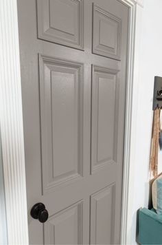 Elephant Skin Behr Paint, Greige Interior Doors, Tan Interior Doors, Elephant Grey Paint, Behr Elephant Skin, Dark Gray Interior Doors, Light Grey Paint, Interior Door Color, Interior Door Colors