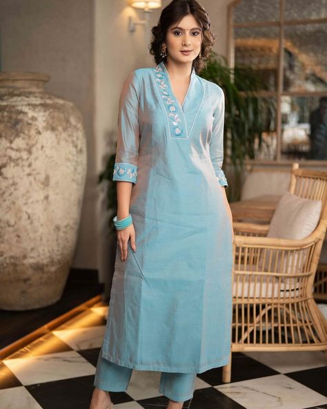 Elevate your wardrobe with this stunning Firozi Blue Chanderi Pant & Kurta set. Delicately adorned with intricate glass beadwork on the neckline and sleeves, this outfit exudes elegance. Made from high-quality Chanderi fabric, the set promises both comfort and style. Bonus: Dupatta is optional for versatile styling. #sujatra #sujatraglobal #sujatrakurtis #chanderikurti #kurtapantset #chanderipants #gladsbeadwork #beadwork #chanderisilk #festivewear #occasionwear Kurta With Dupatta For Women, Chanderi Kurta Designs, Churidar Neck Designs, Ethnic Suit, Suit Salwar, Blue Kurta, Kurtis With Pants, Everyday Fashion Outfits, Indian Designer Outfits